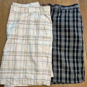 Two pairs of men’s plaid shorts